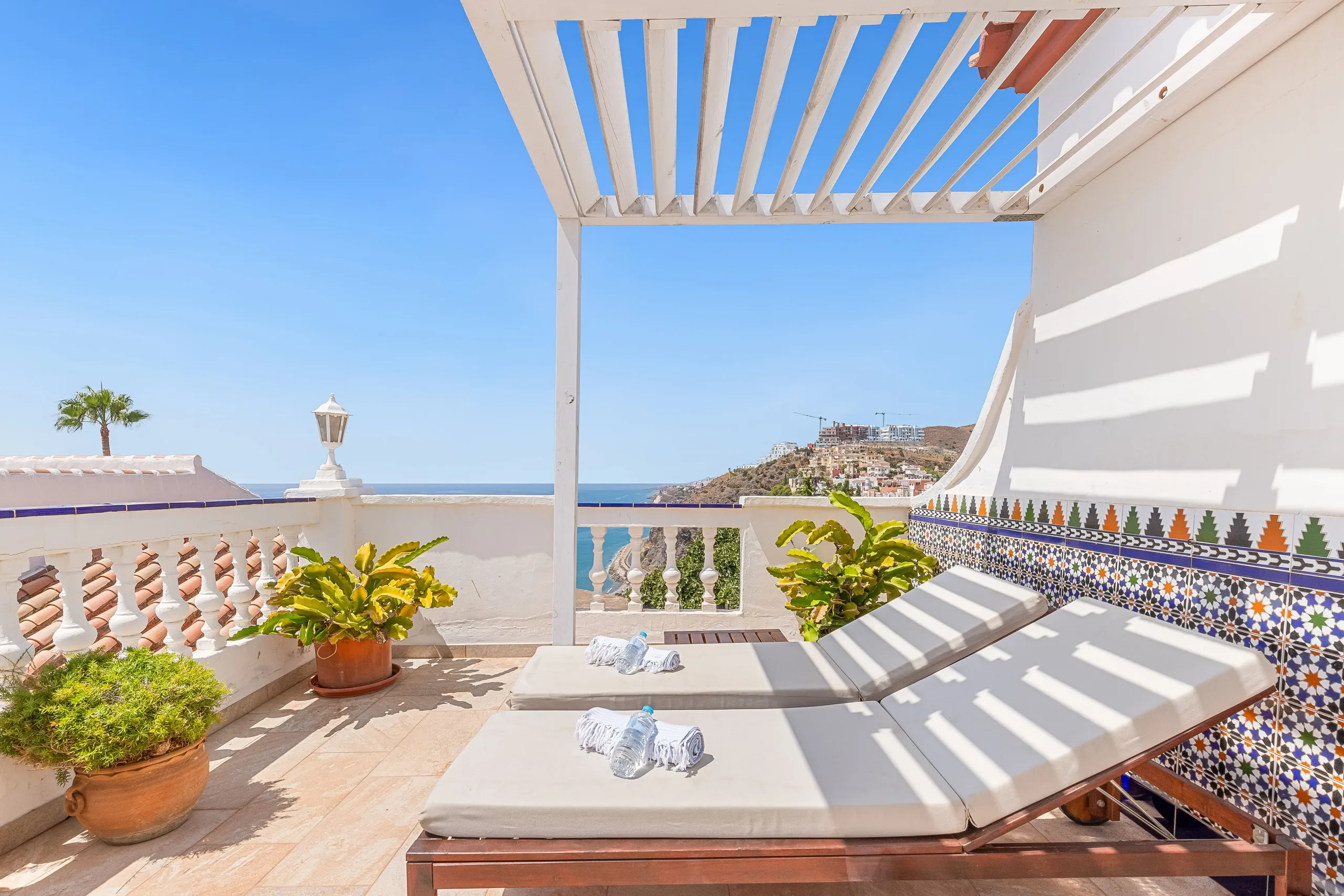 Panoramic view of the Nerja coastline with cliffs and the Mediterranean Sea