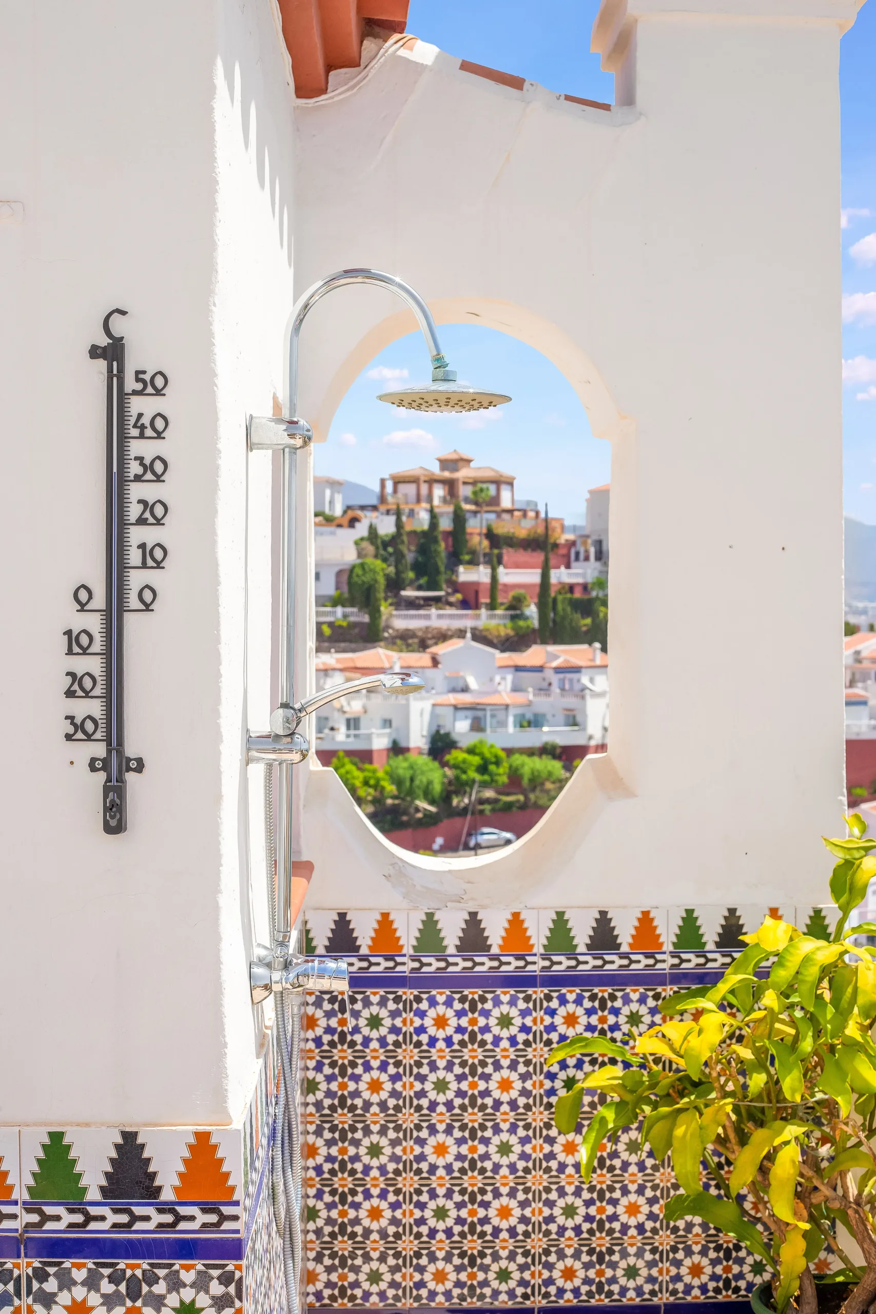 Outdoor shower on the terrace with a 180-degree view of the Mediterranean Sea, offering a unique and refreshing experience.
